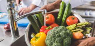 Save It; Don’t Waste It – Tip No. 9 cropped image of african american chef washing vegetables at restaurant kitchen